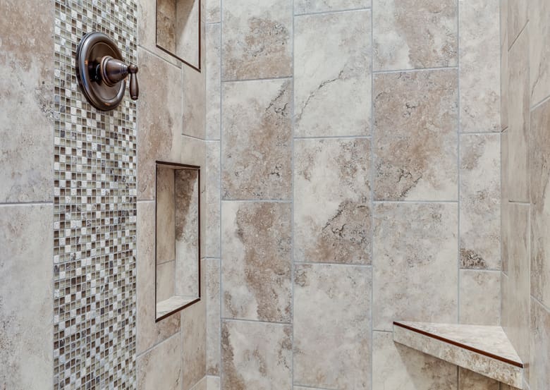 Uptown-Tile-Inc-Mosaic-Tile-Bathroom-GettyImages-1362321194