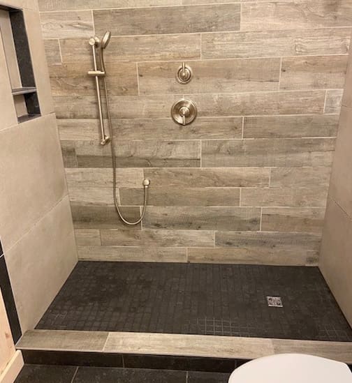 Uptown-Tile-Inc-Tan-and-Black-Bathroom